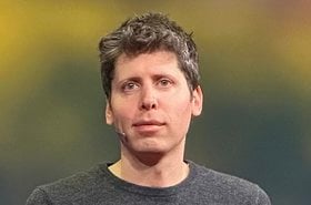 1024px-Sam_Altman_speaking_at_TED_(cropped)